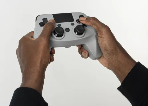 Hands holding a game controller